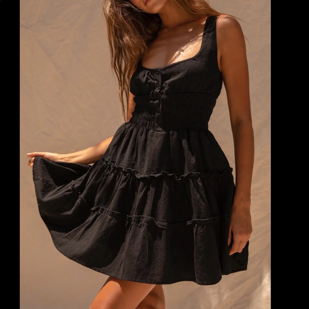 Black tiered smock mini dress.